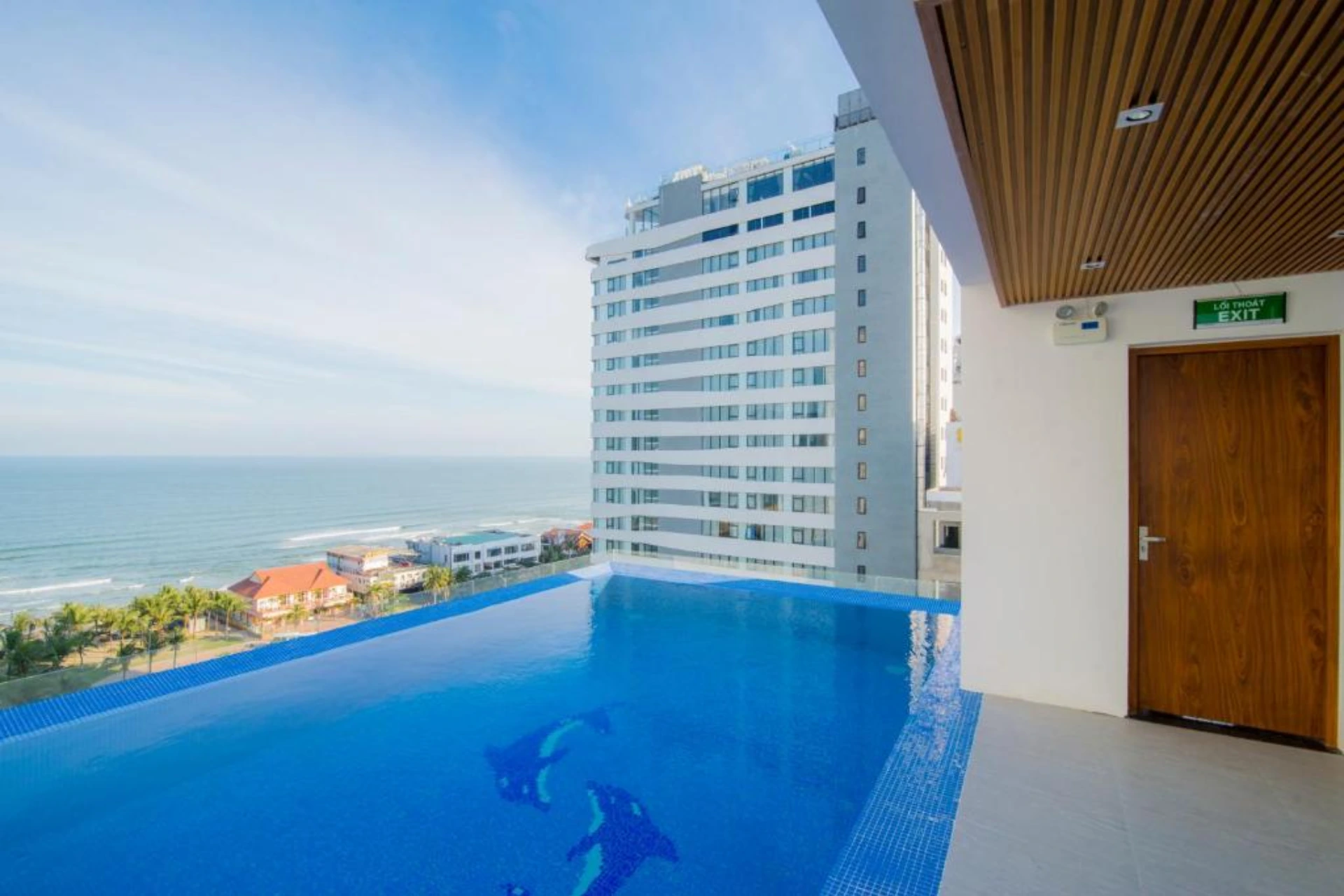 Rooftop pool at Soho Da Nang with ocean view
