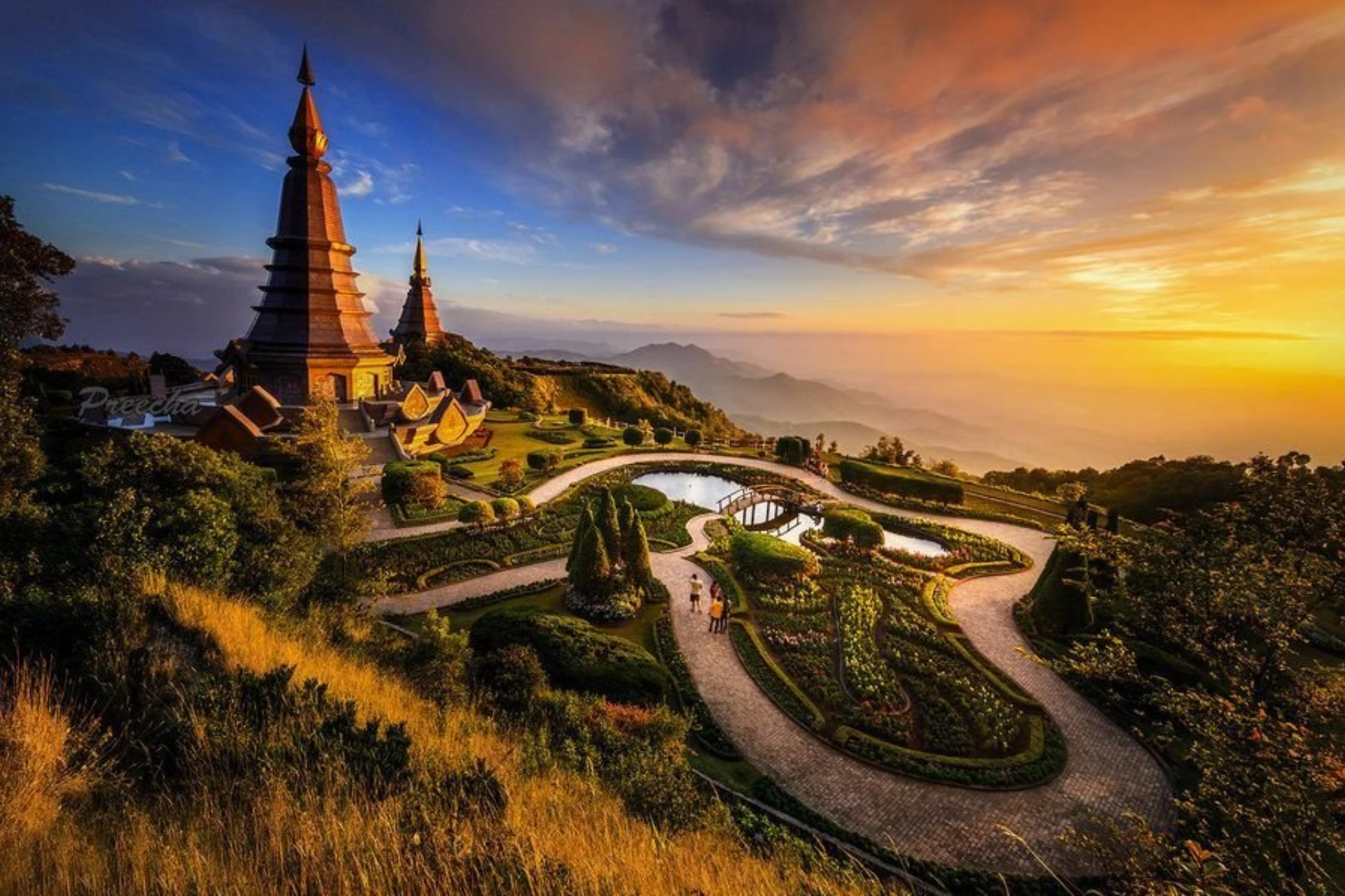Golden temples at sunset in Doi Inthanon National Park Thailand