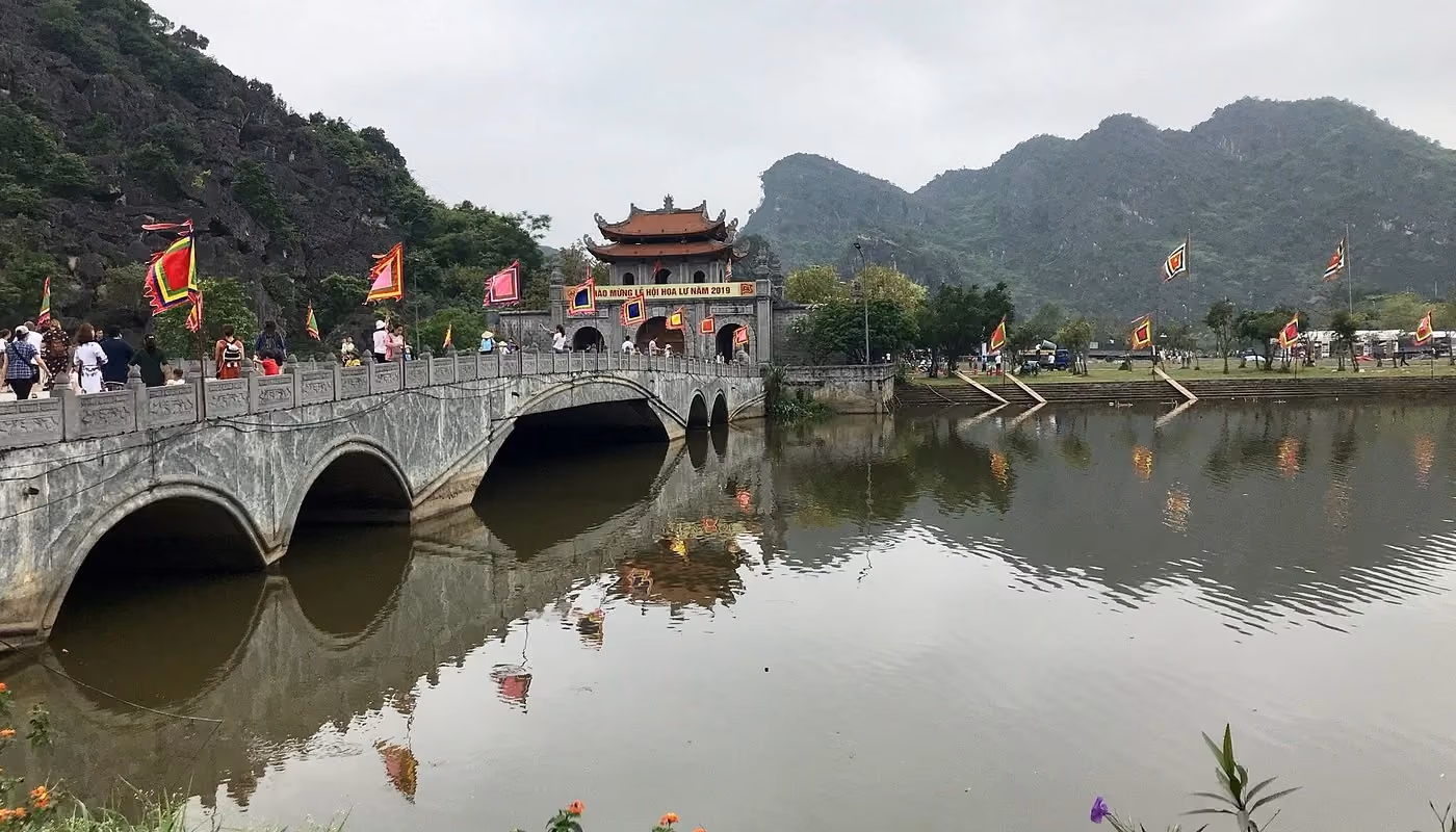 Stone bridge crossing river at Hoa Lu ancient temple