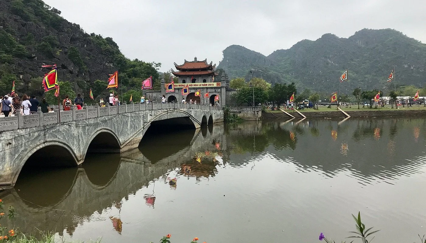 Stone bridge crossing river at Hoa Lu ancient temple