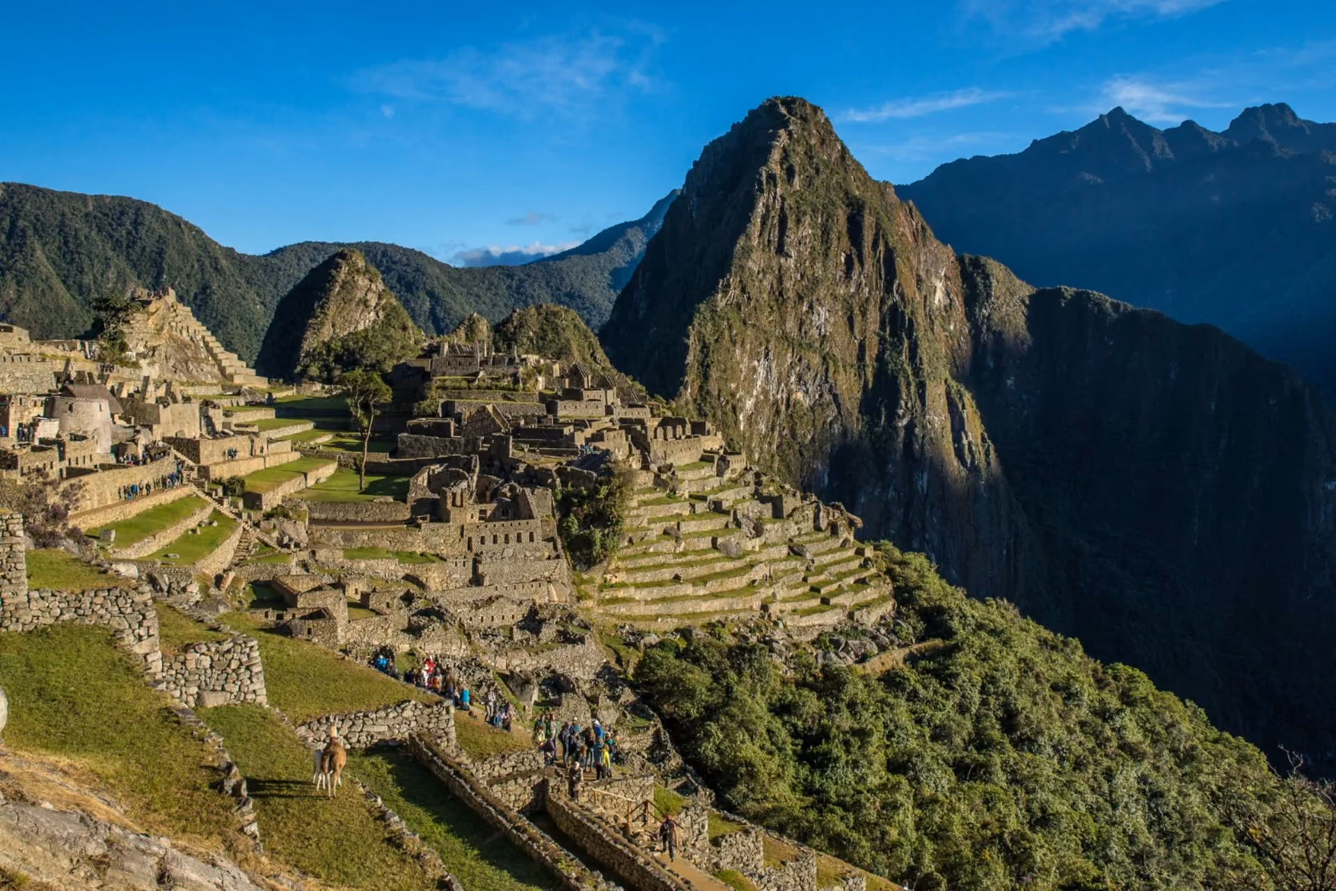 Panoramic view of Machu Picchu ruins and mountains in Peru — best travel destination to visit in June
