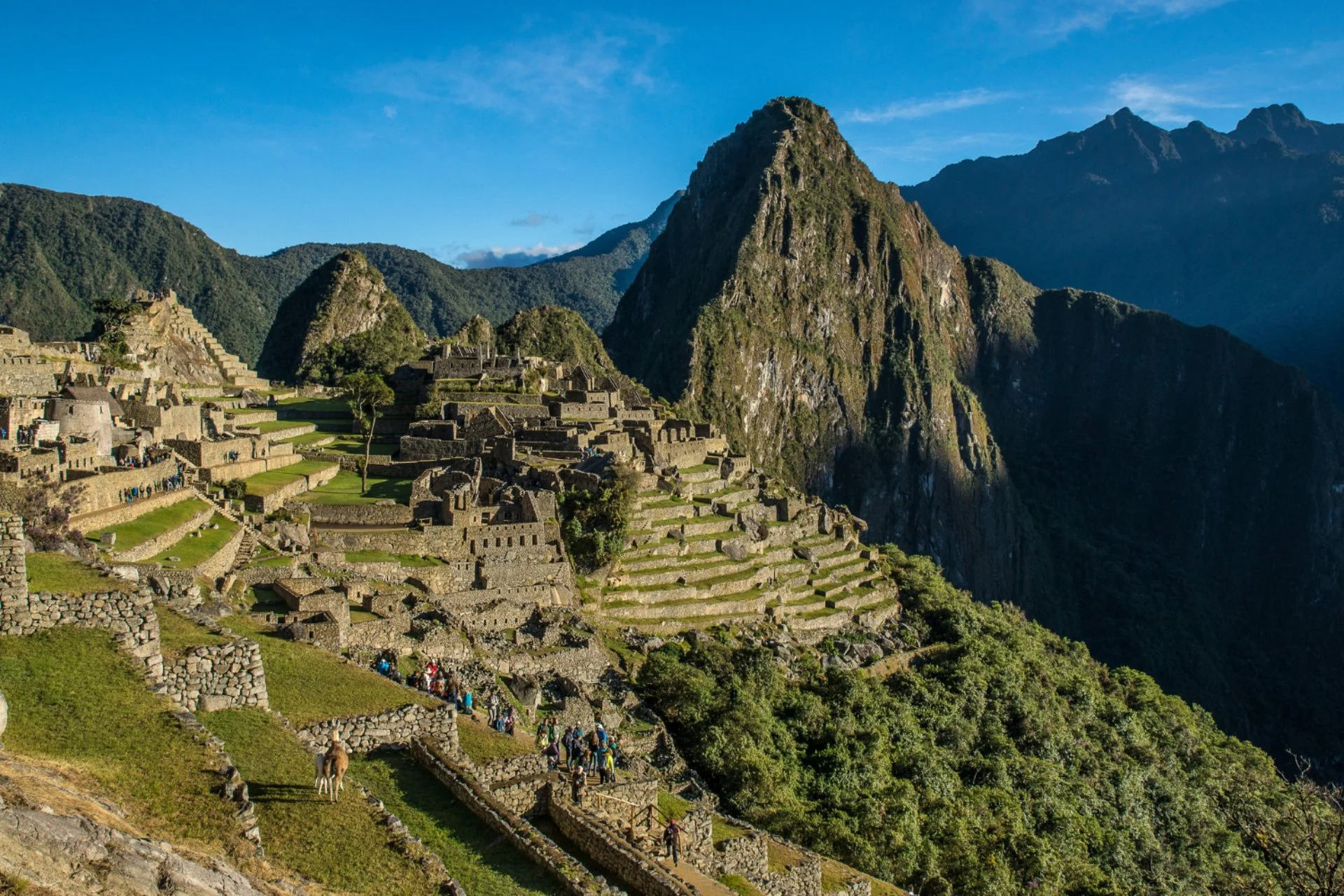 Panoramic view of Machu Picchu ruins and mountains in Peru — best travel destination to visit in June
