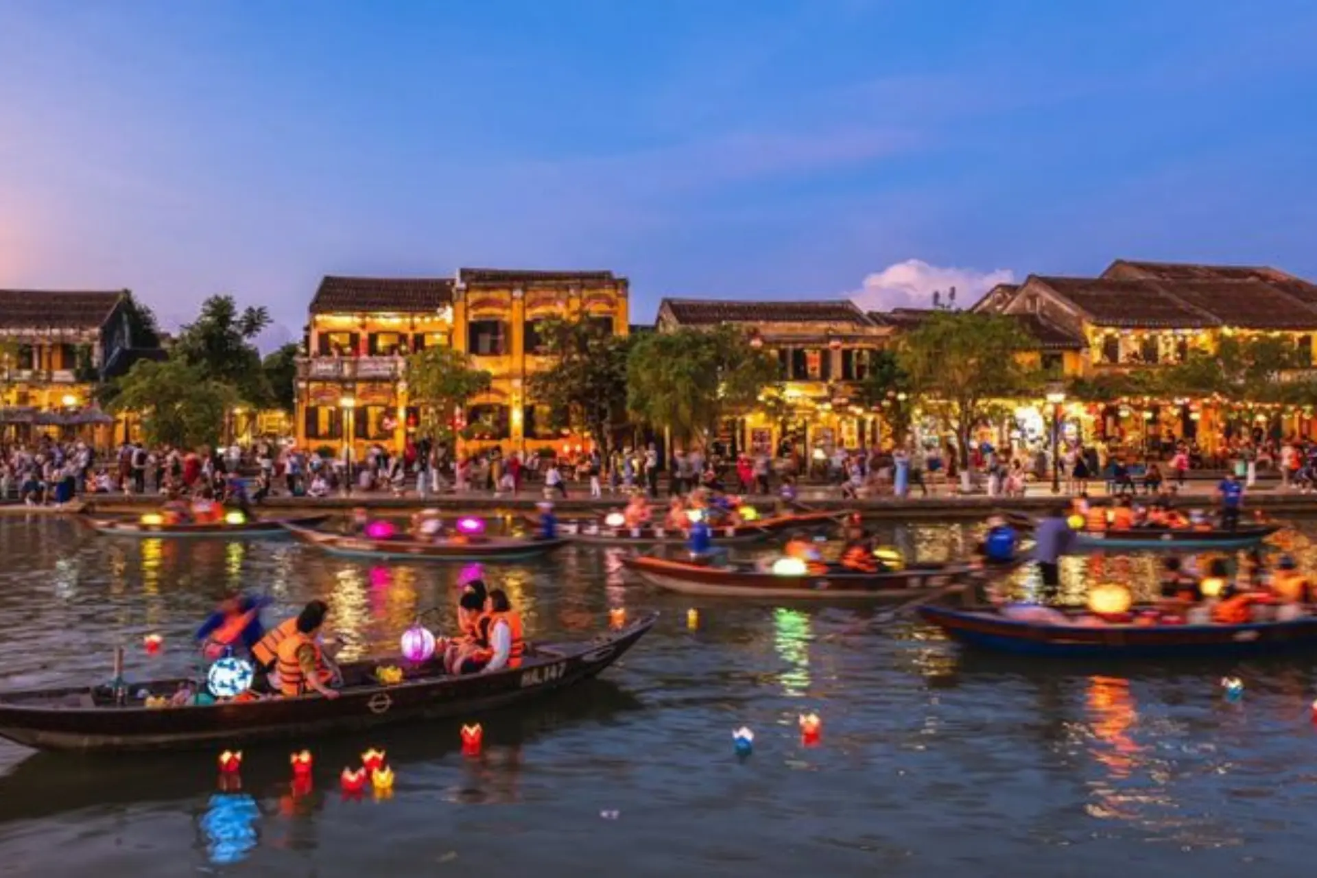 People enjoying lantern boat ride in Hoi An