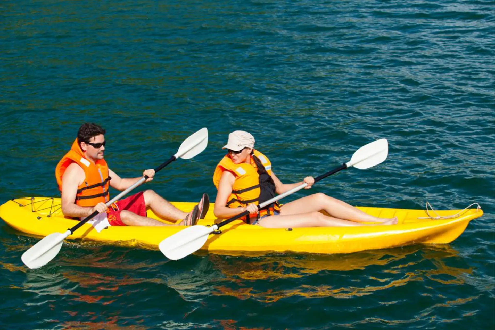Couple enjoying kayaking in Ha Long Bay