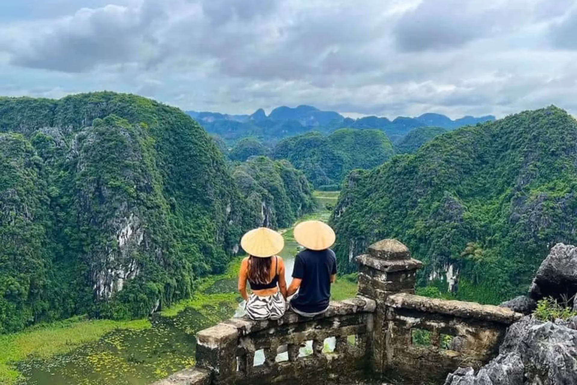 couple enjoying amazing views from Hang Mua