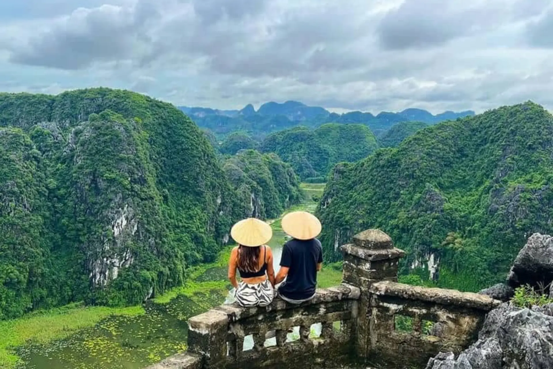 couple enjoying amazing views from Hang Mua