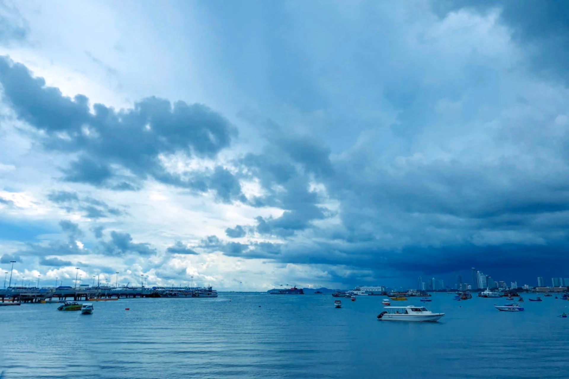 Thailand weather in November with clear coastline, calm sea, and cloudy skies, ideal for travellers comparing Thailand vs Maldives in November