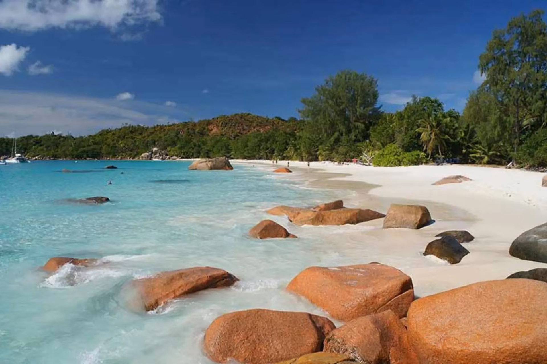 Anse Lazio Beach in Seychelles with white sand and granite boulders