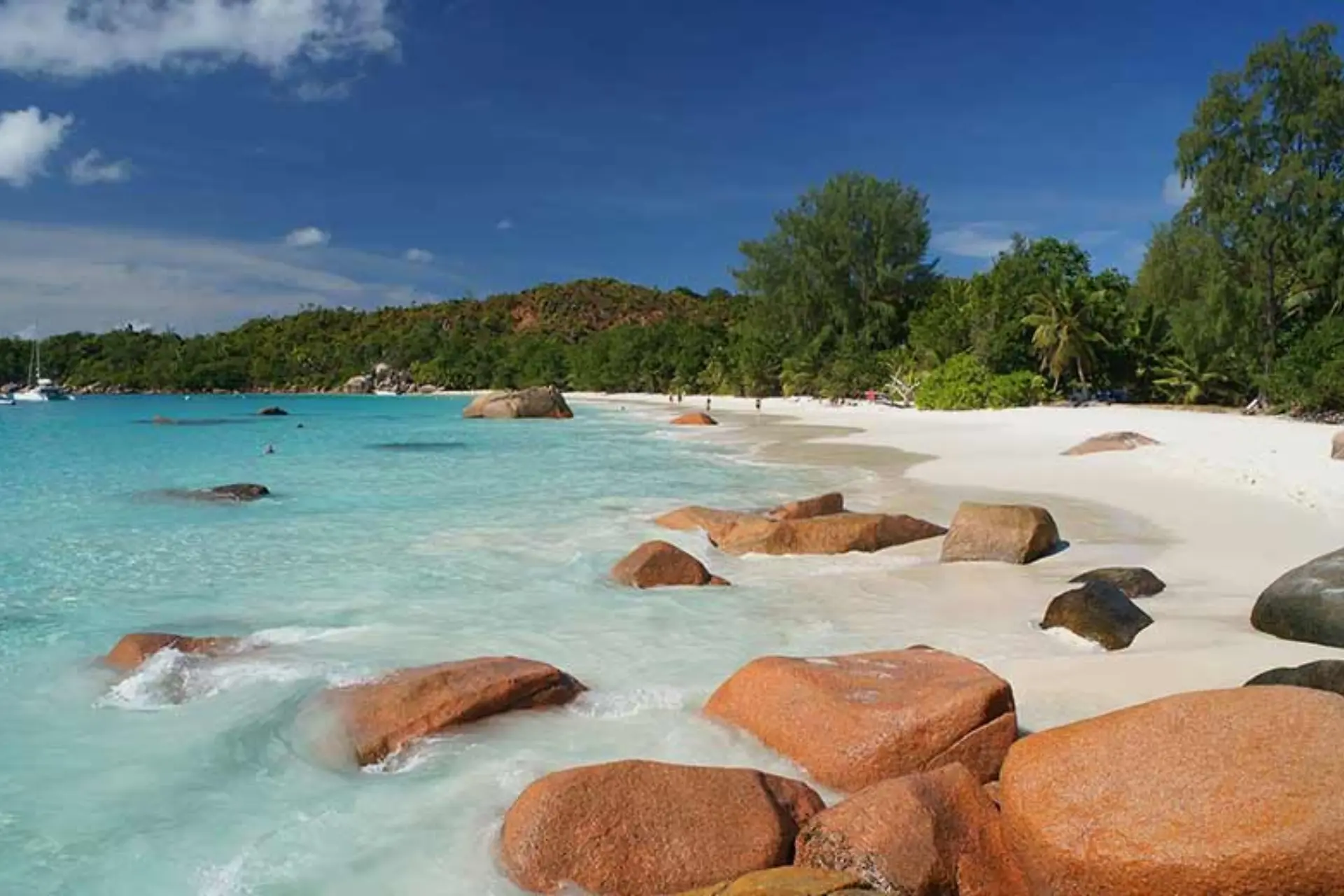 Anse Lazio Beach in Seychelles with white sand and granite boulders