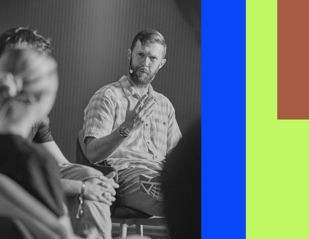 Group of three speakers on the stage at SmartCon