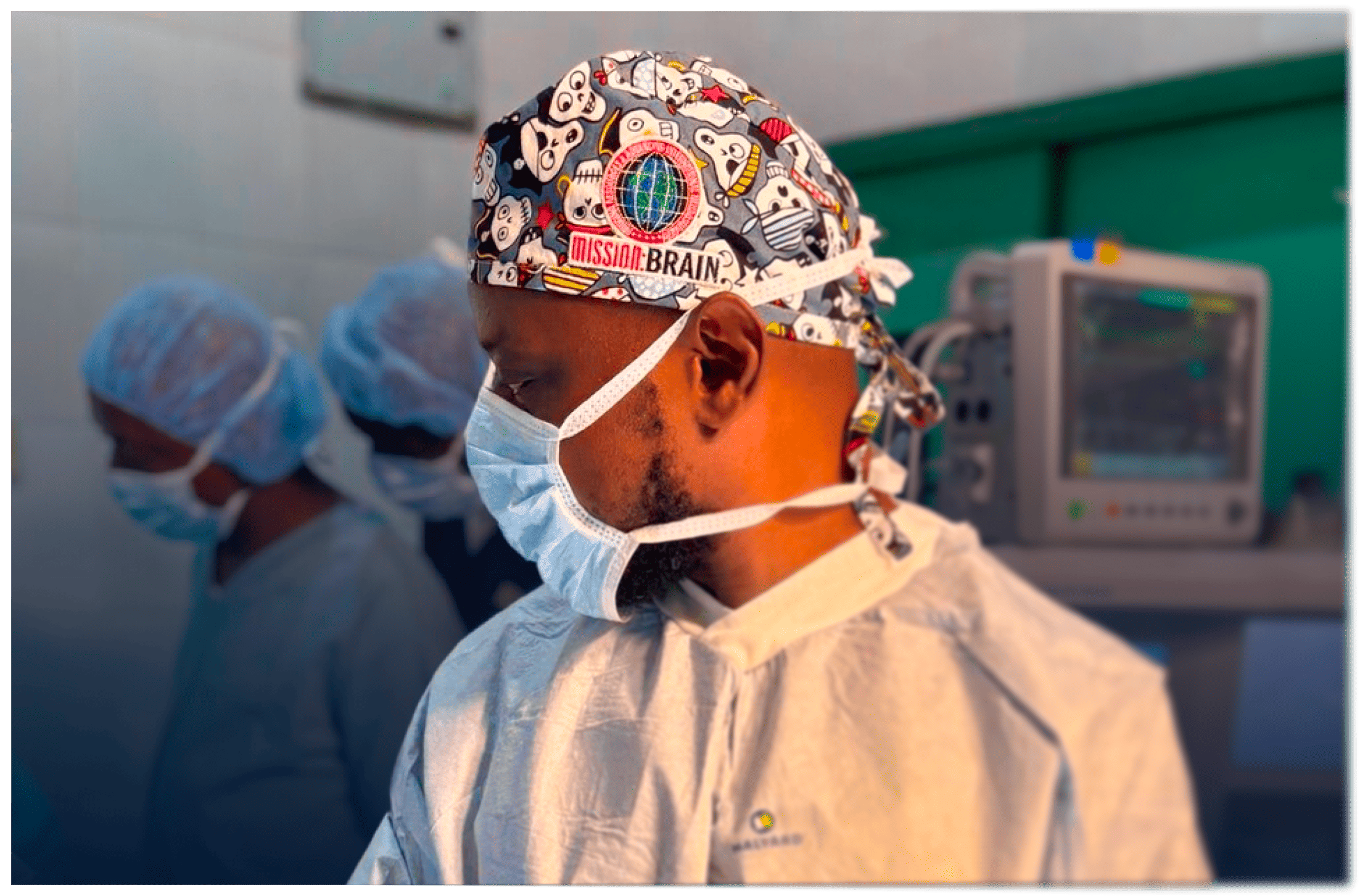A Mission:Brain surgeon prepares in the operating room, wearing a custom scrub cap featuring the organization’s logo—capturing the global reach and dedication of the surgical team beyond Guadalajara.