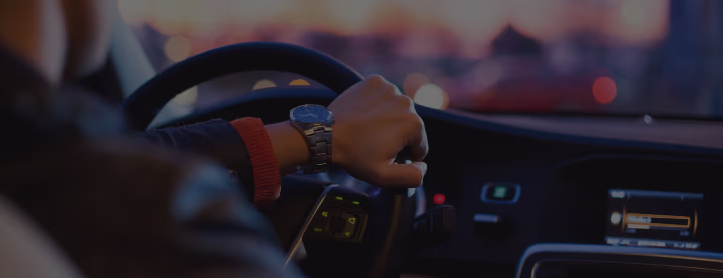 Man driving a sports car