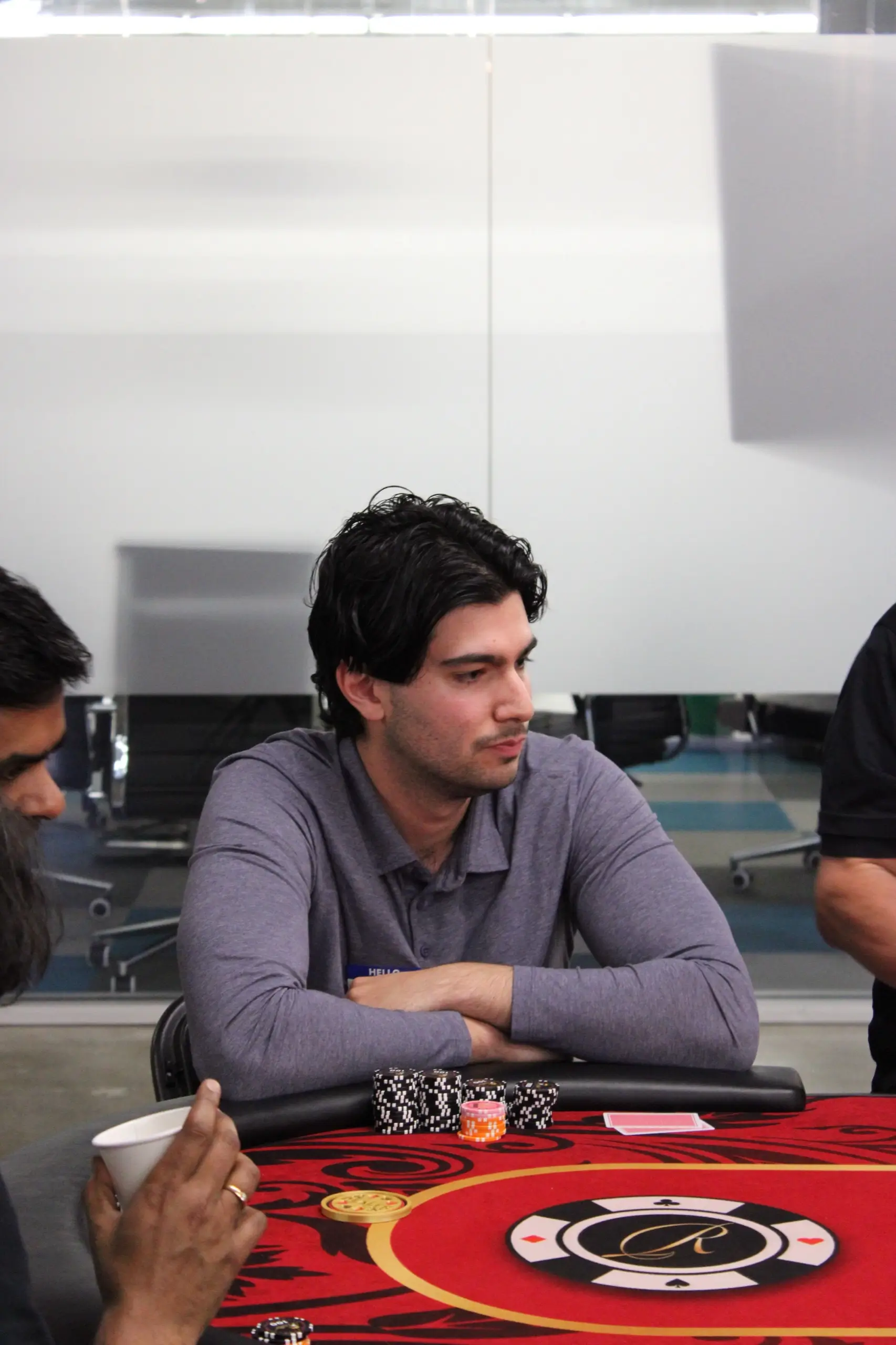 Person playing poker at a table