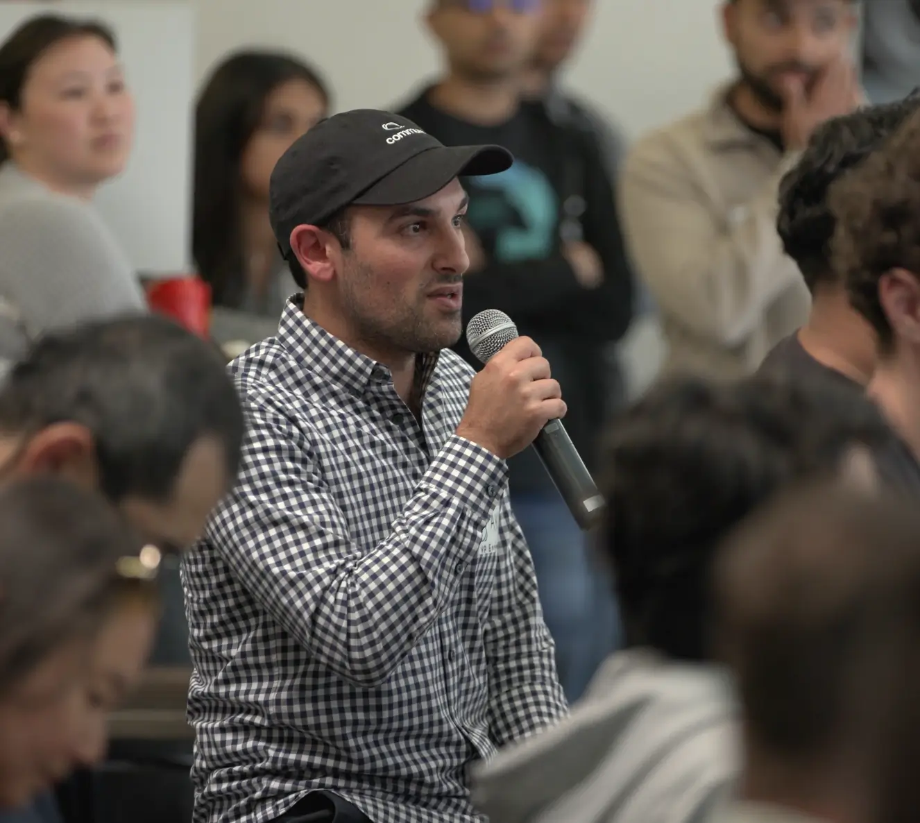 Audience member speaking with a microphone