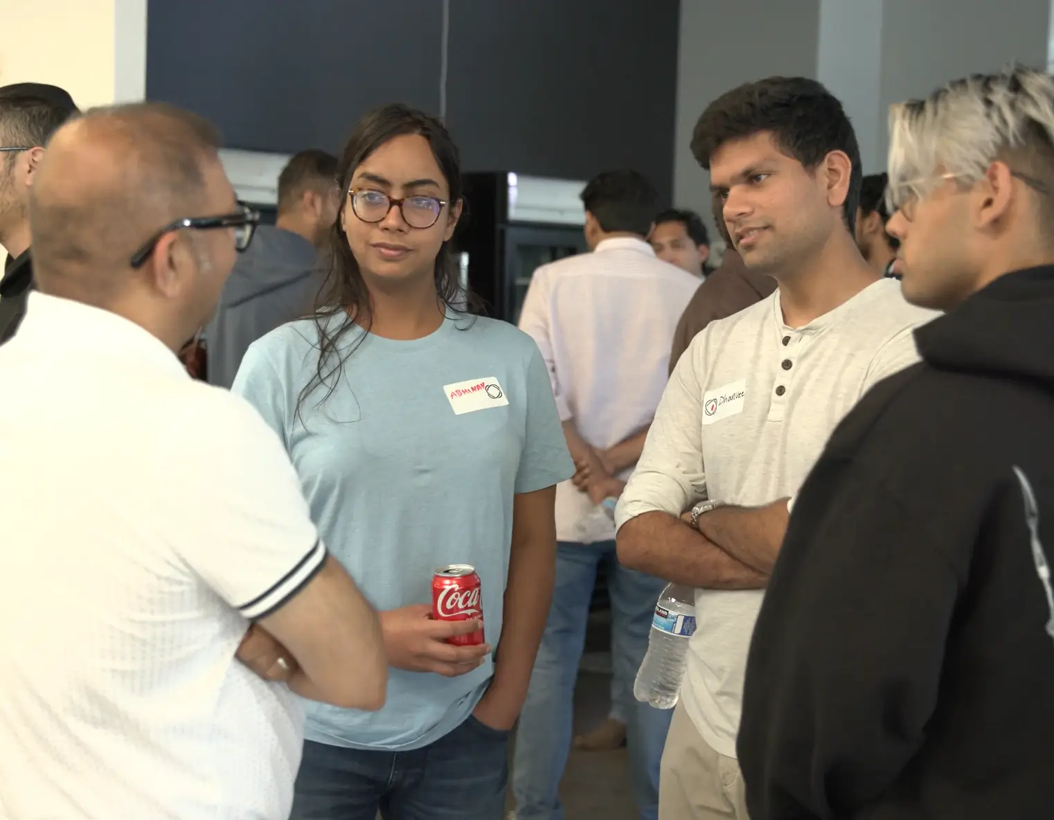 People chatting at an event