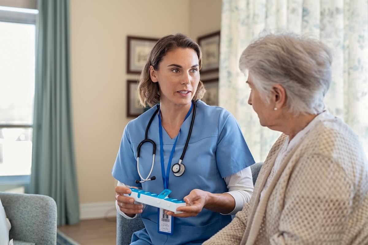 clinician talking to woman