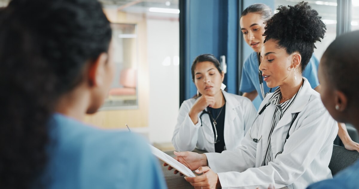 clinicians looking at chart