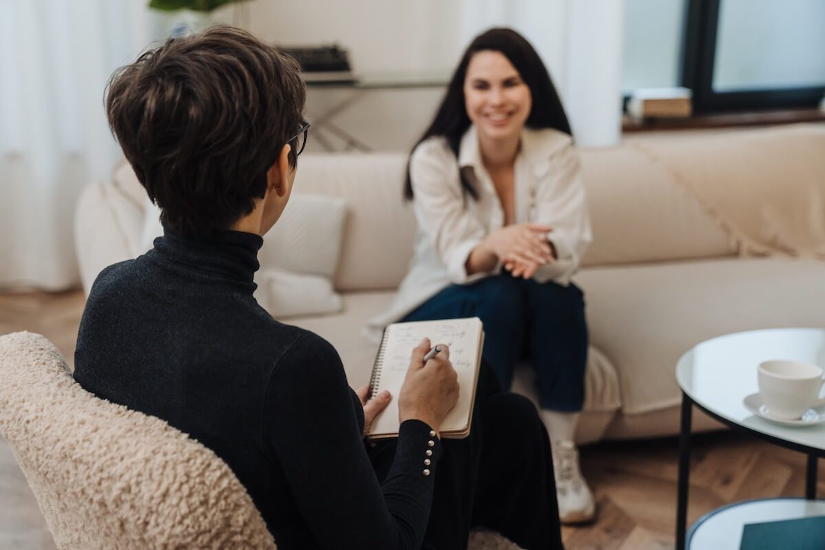 clinician talking to patient
