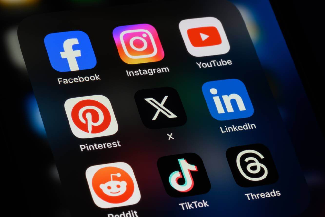 social media app icons including Facebook, Instagram, YouTube, Pinterest, X, LinkedIn, TikTok