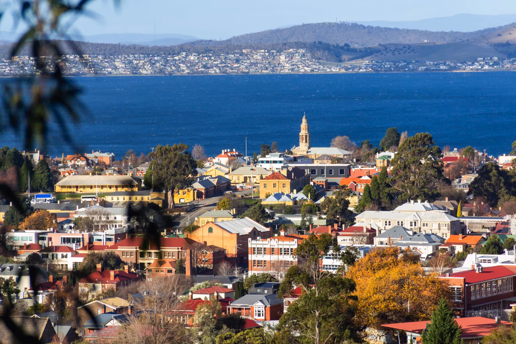 Hobart skyline looking out to infrastructure and water.