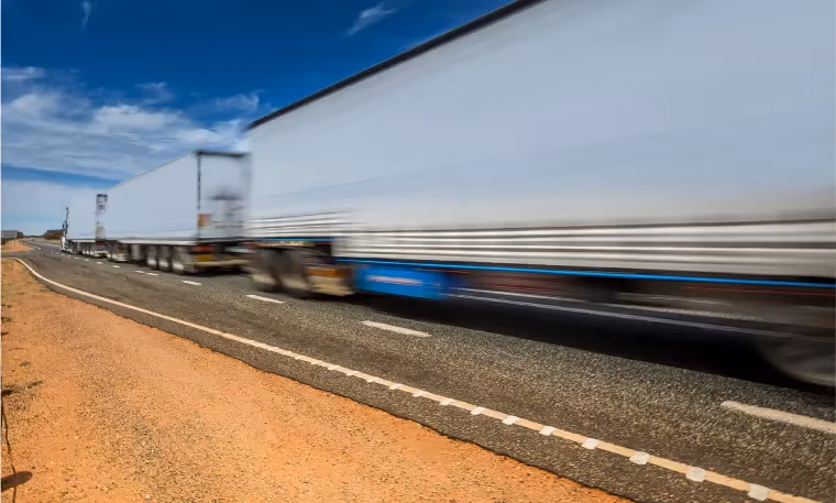 Heavy vehicle moving along highway