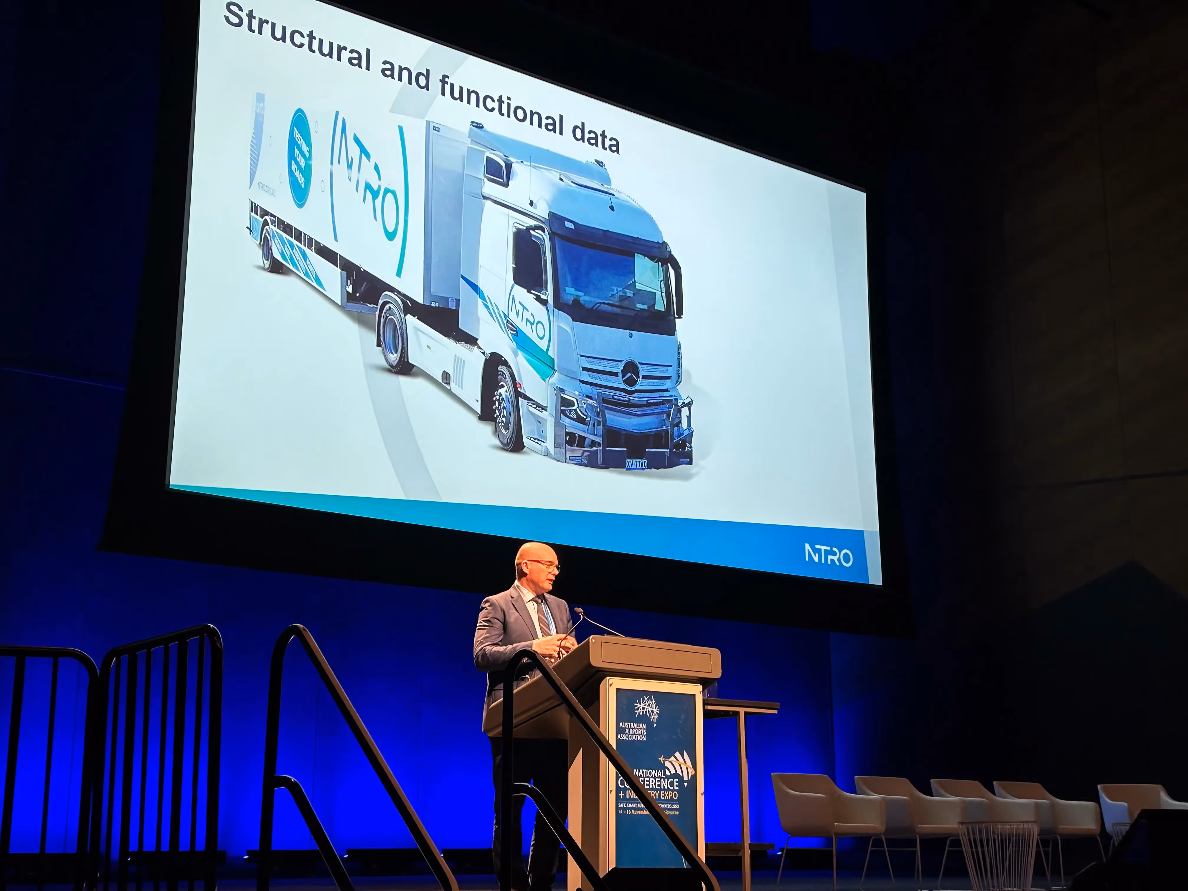 Richard Wix presenting mid shot