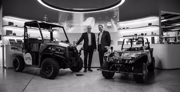 ARRB CEO Michael Caltabiano and AOS Group's Dr Andrew Lucas with The Kelpie - an autonomous off-road ground vehicle for defence and agriculture