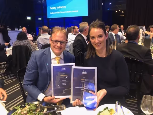 ARRB's Joe Grobler and Zia Rice with AAPA award for NACOE