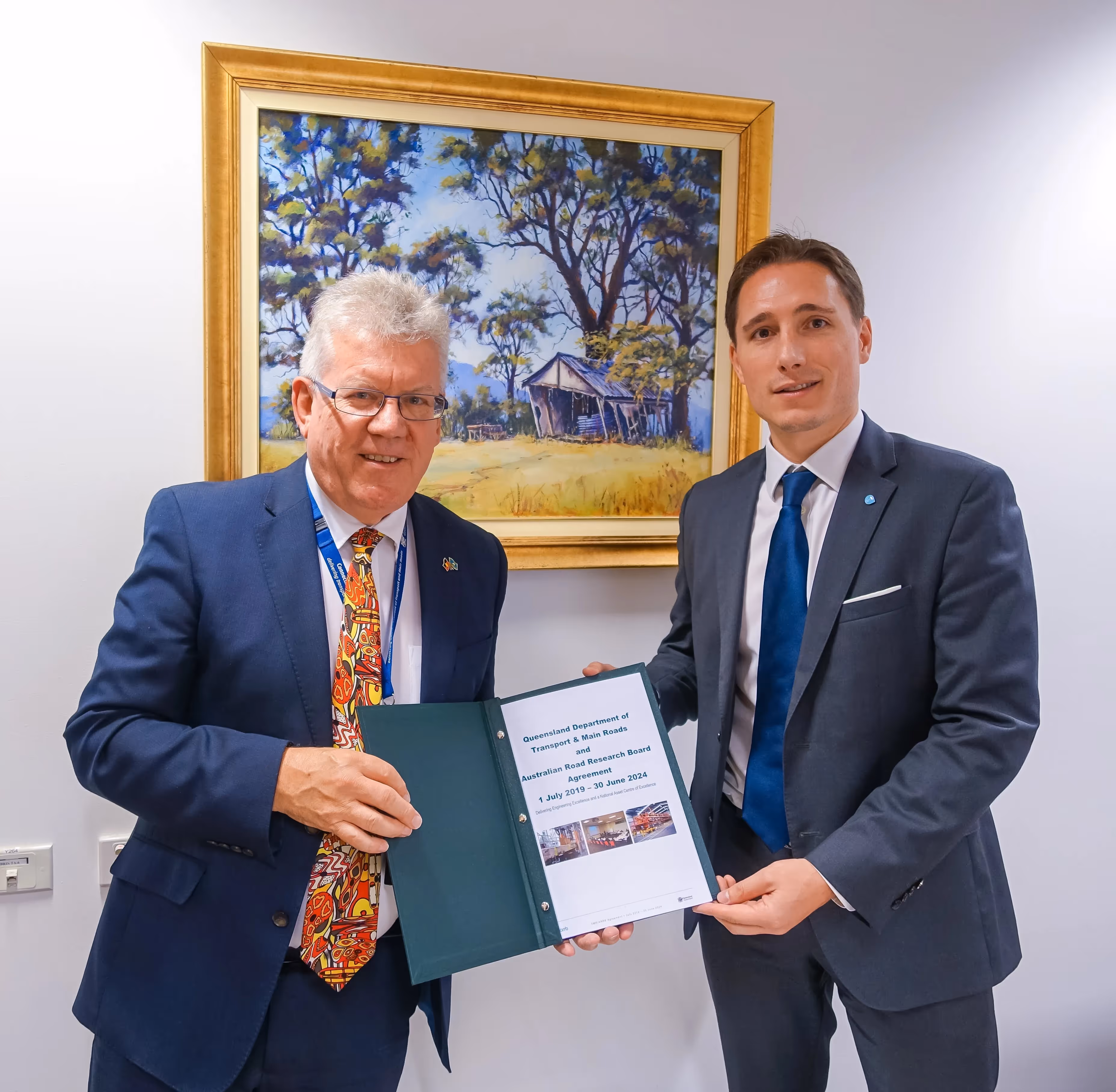 Neil Scales OBE from TMR Queensland and Matthew Bereni from ARRB