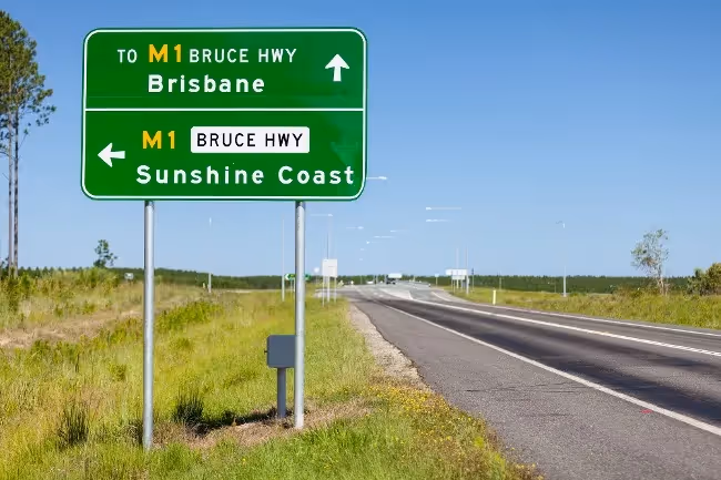 Road sign showing directiions to Brisbane and Sunshine Coast in Queensland