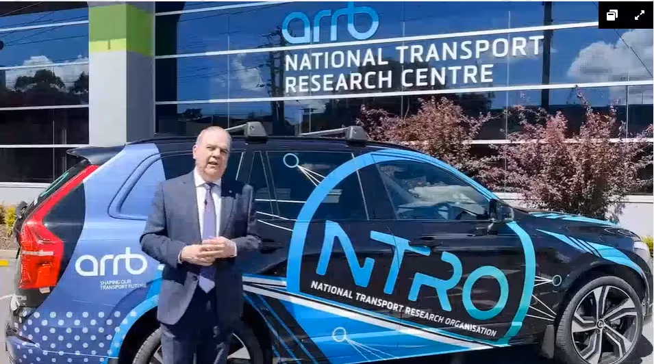 NTRO CEO Michael Caltabiano in front of an NTRO semi-autonomous electric vehicle