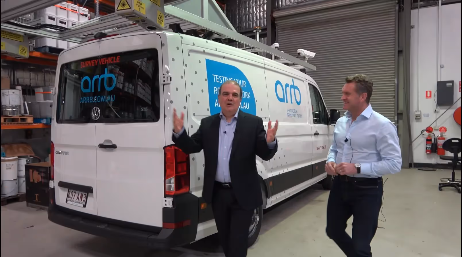 Michael Caltabiano and Jeff Doyle with NTRO's new Network Survey Vehicle (NSV)