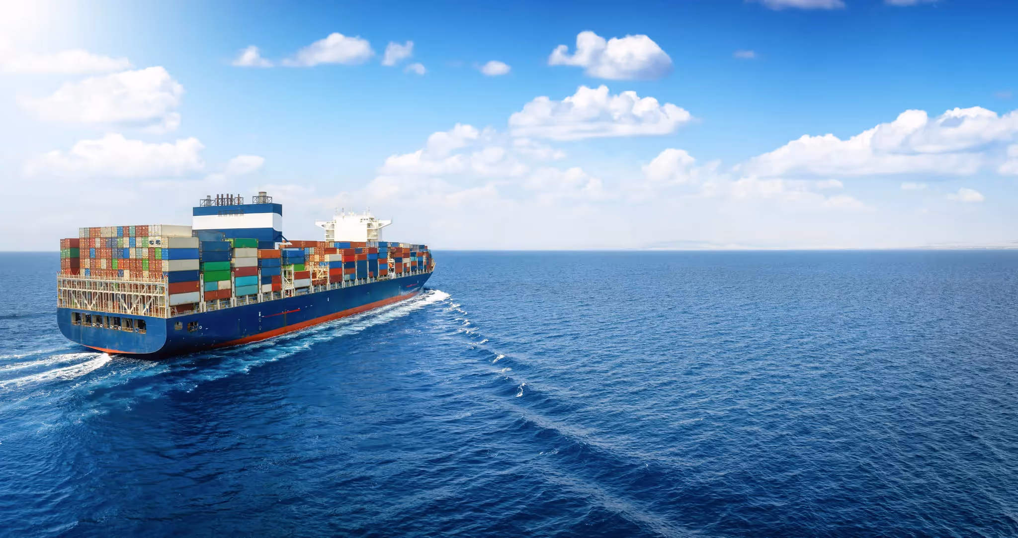 Cargo ship sailing through the ocean.