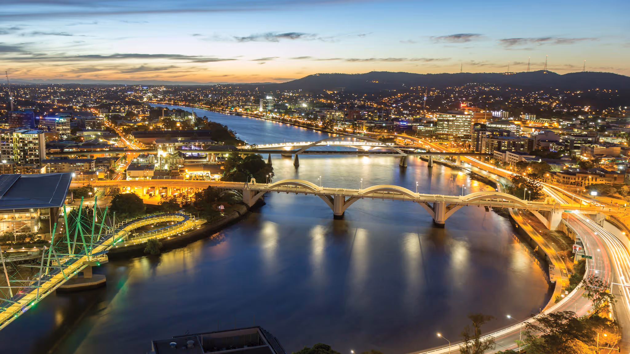 Birds eye city view, focusing on roads and bridges