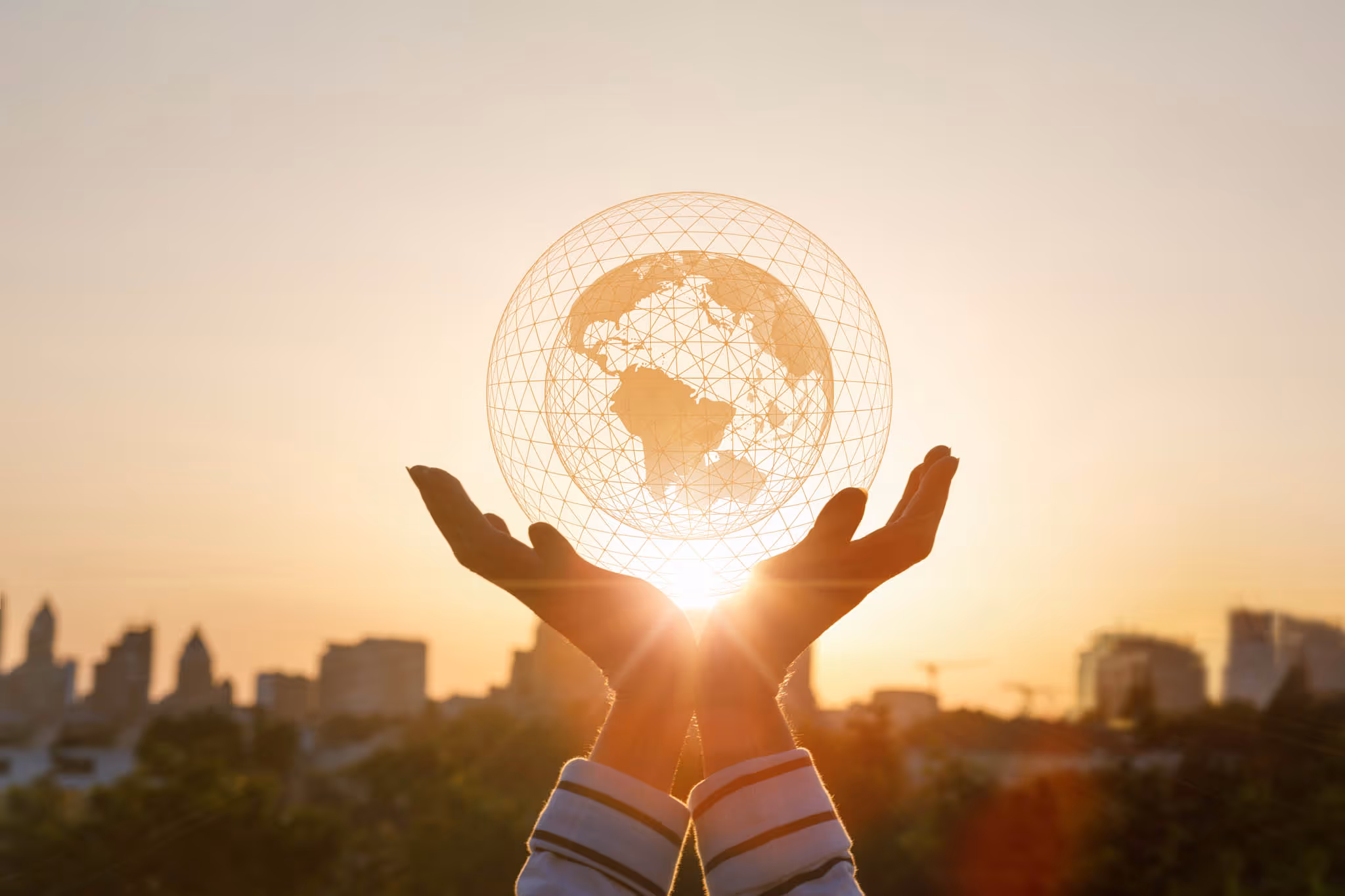 Person holding holographic globe