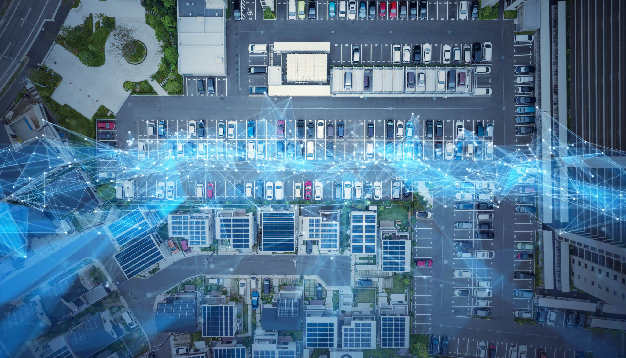 A car park with holographic connetced nodes over the top.
