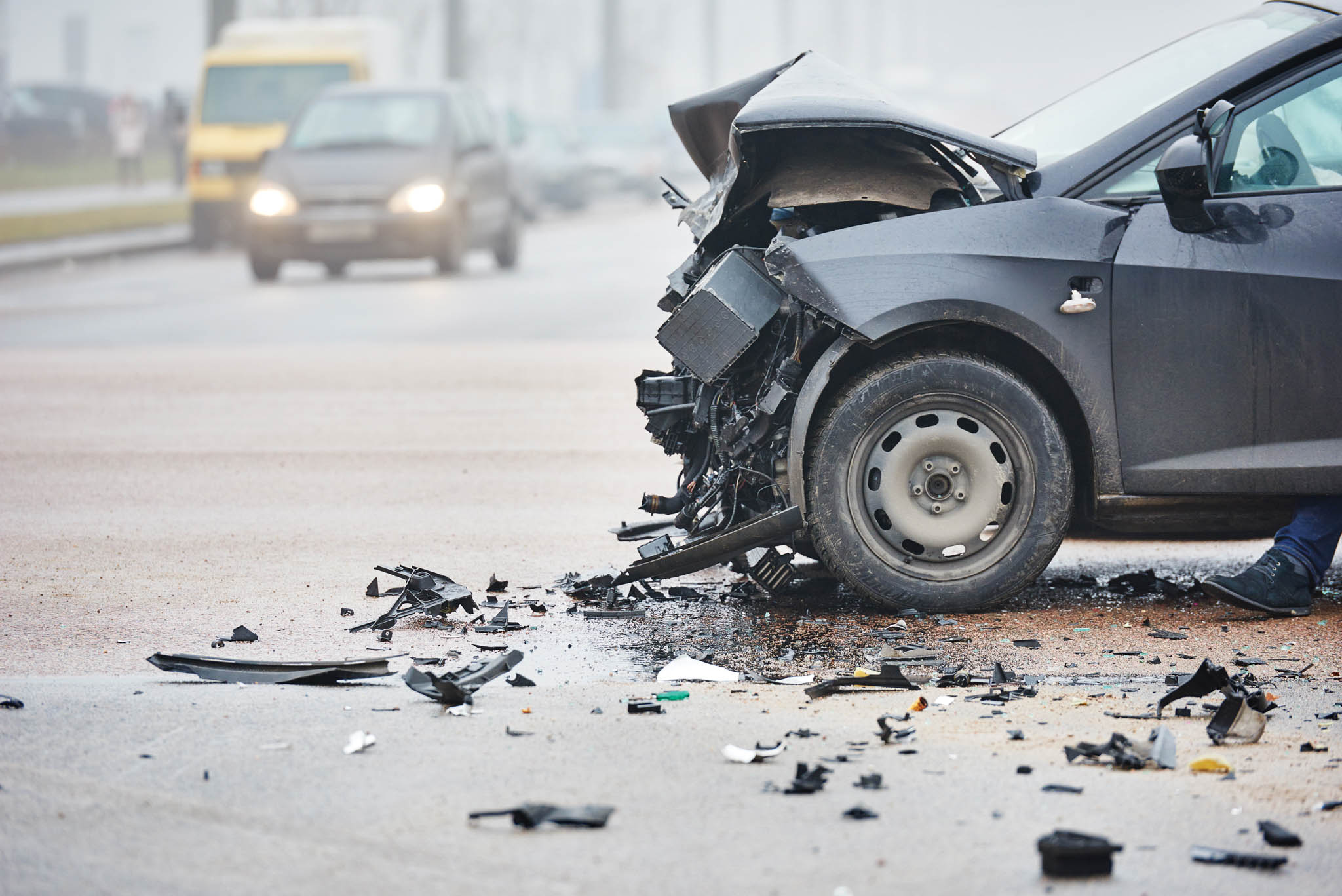 Car in piece after a car crash.