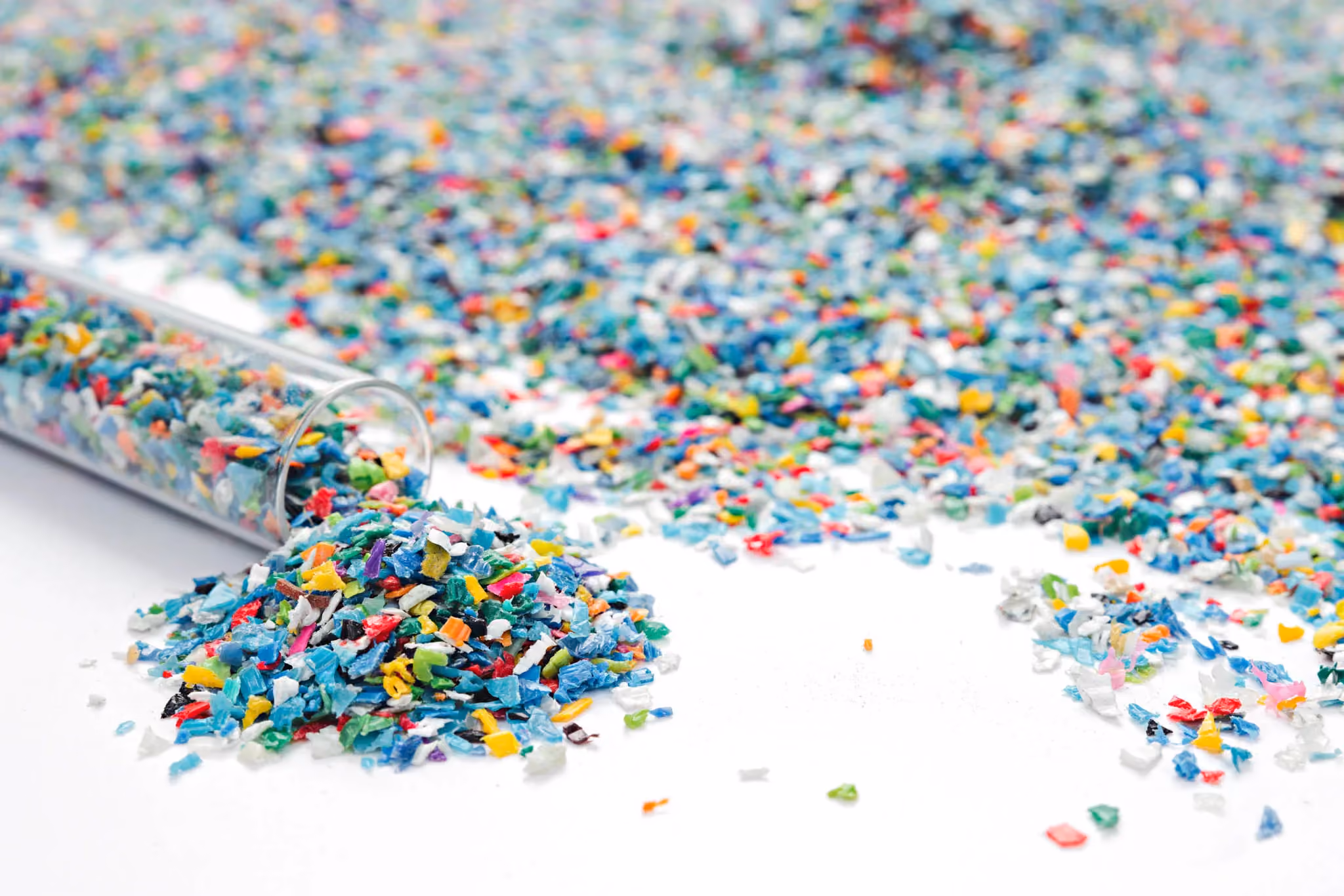 Recycled materials falling out of a small test tube