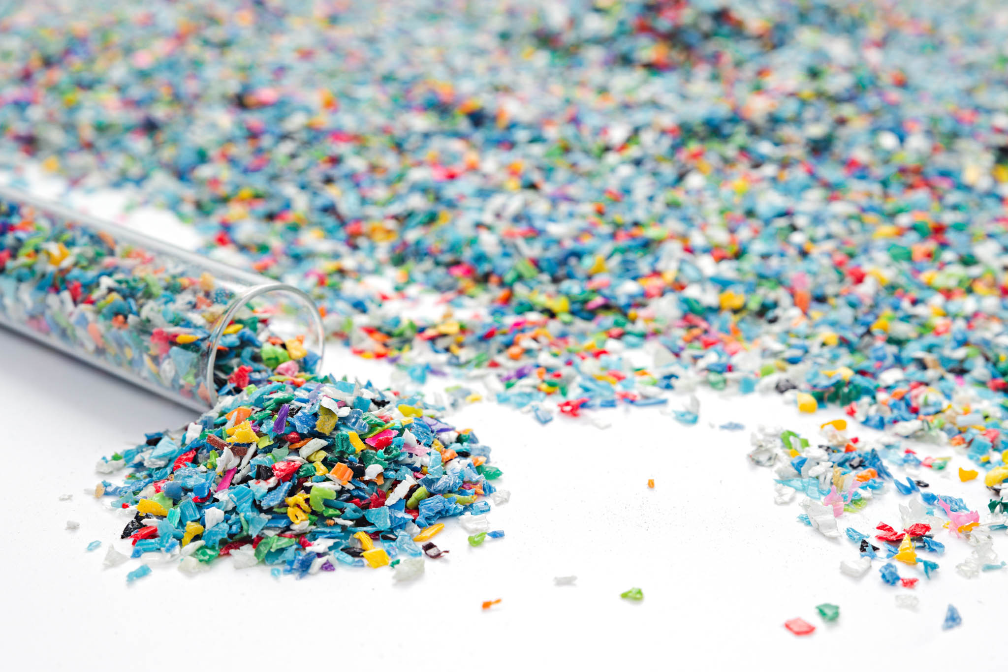 Recycled materials falling out of a small test tube