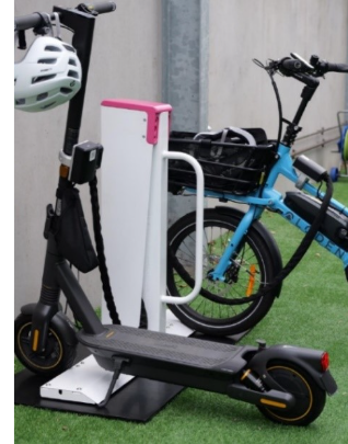 A group of electric scooters and a bicycleDescription automatically generated