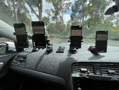 A car with multiple devices on the dashboardAI-generated content may be incorrect.