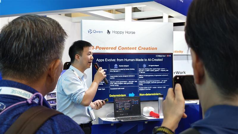 Alibaba Cloud Qwen demonstration attracting an audience at ATxEnterprise