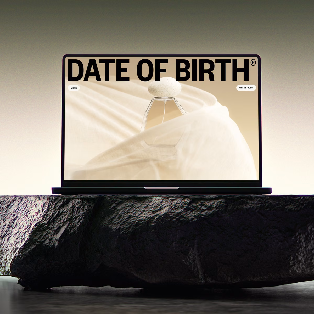 Date of Birth website shown on a laptop