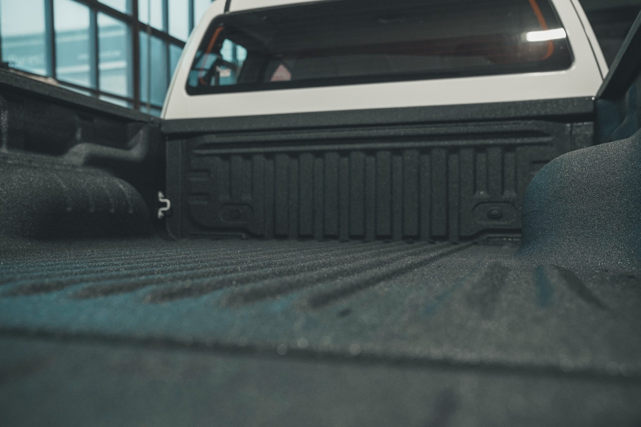 Close up image of a rubberised bakkie bed liner