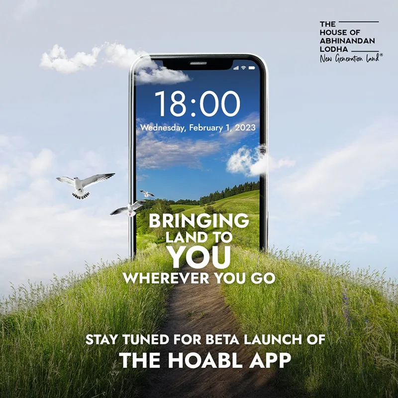 Mobile app launch graphic with smartphone rising from grassy landscape, birds, clouds, and land promotion text