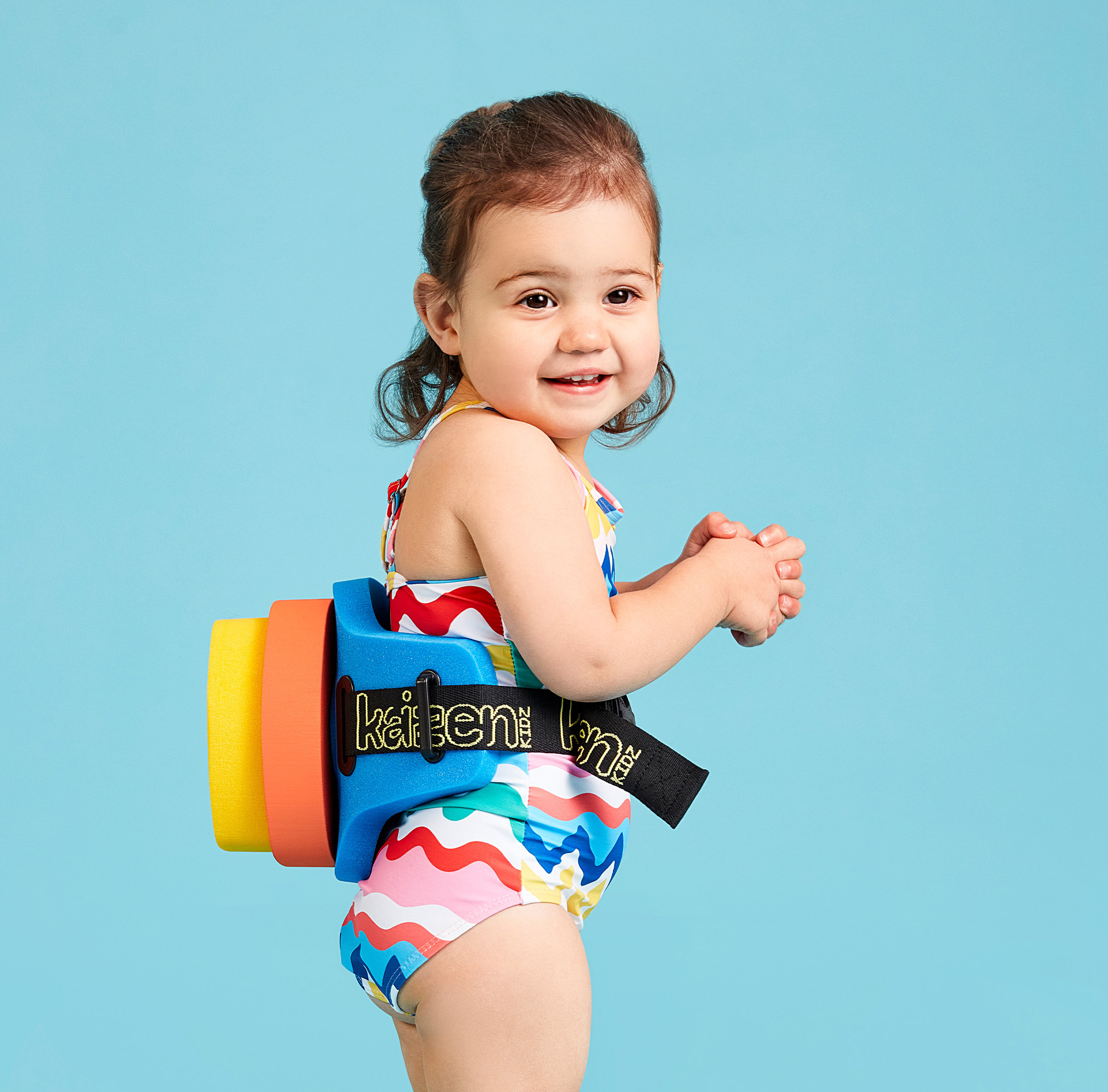child wearing the 3-2-1 Swim Pack created by Kaizen Kidz