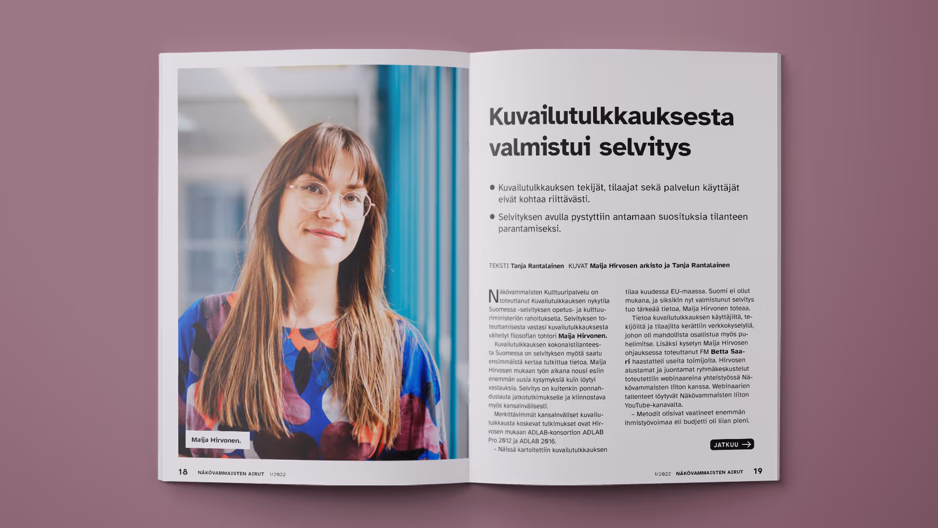 Ison jutun saavutettava taittomalli, jossa sivun kokoinen kuva ja tekstiä.
