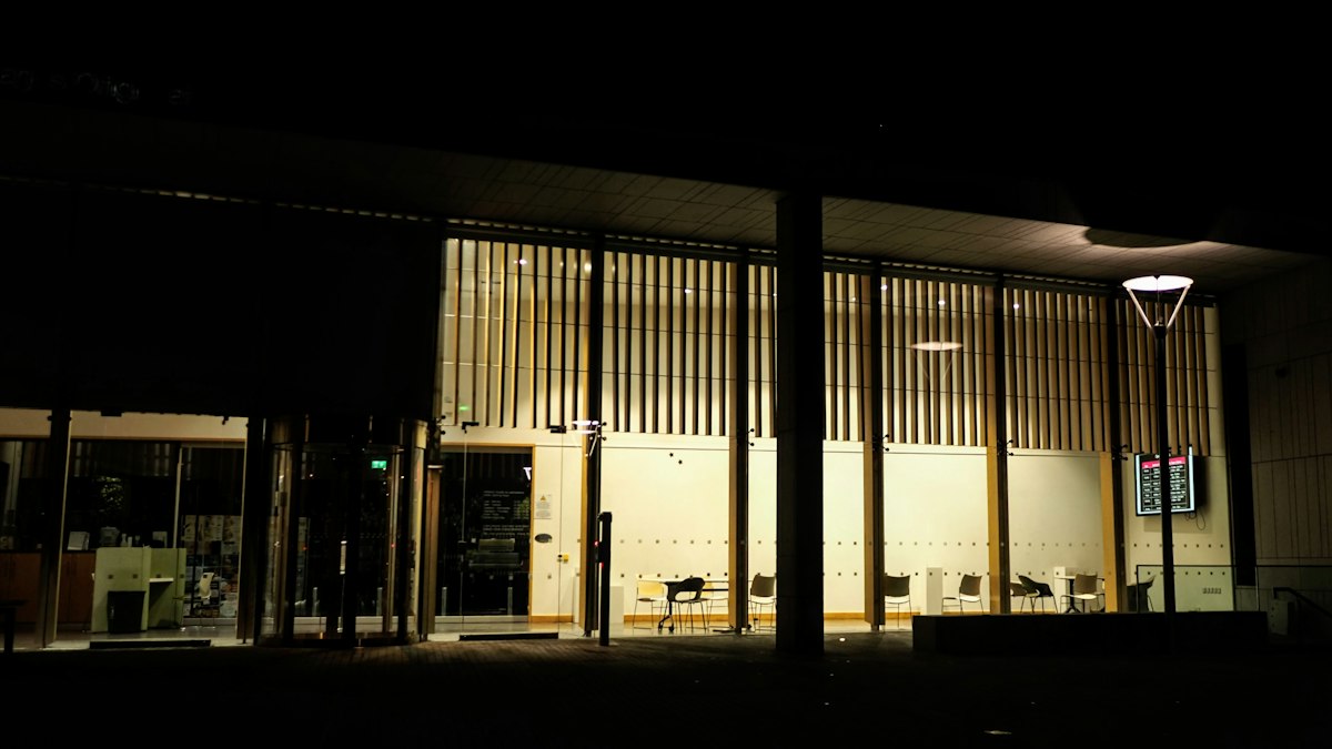 Modern civic building at night