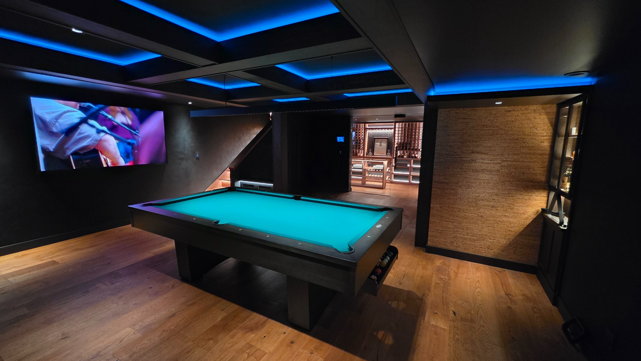 Architectural cove lighting and integrated illumination in a games room