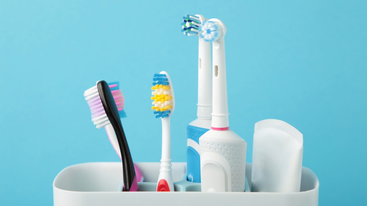 Toothbrushes in a bathroom container